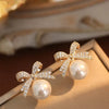 Bow Stud Earrings with Rhinestones and Acrylic Pearls