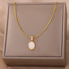 Gold Tone Oval Stone Pendant Necklace