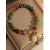 Colorful Beaded Bracelet with a Lily of the Valley Charm