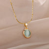 Gold Tone Oval Stone Pendant Necklace