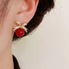 Bow Stud Earrings with Rhinestones and Acrylic Pearls