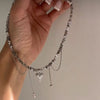 Imitation Pearl Choker Necklace with a Heart Pendant and Tassel Details