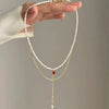 Tassel Pendant Necklace with Transparent Crystal and Imitation Pearl Details
