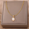 Gold Tone Oval Stone Pendant Necklace