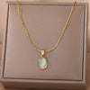 Gold Tone Oval Stone Pendant Necklace
