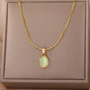 Gold Tone Oval Stone Pendant Necklace