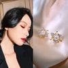 2022 Korean design jewelry copper inlaid zircon three petal flower earrings elegant pearl female daily wild earrings