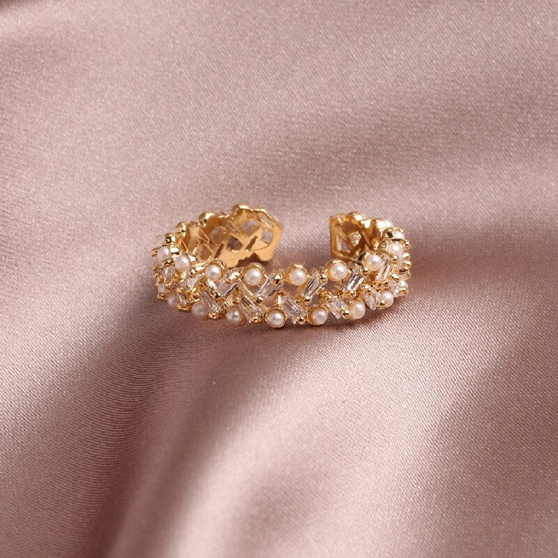 2022 Korean design jewelry exquisite copper inlaid zircon hollow pearl simple round opening female ring