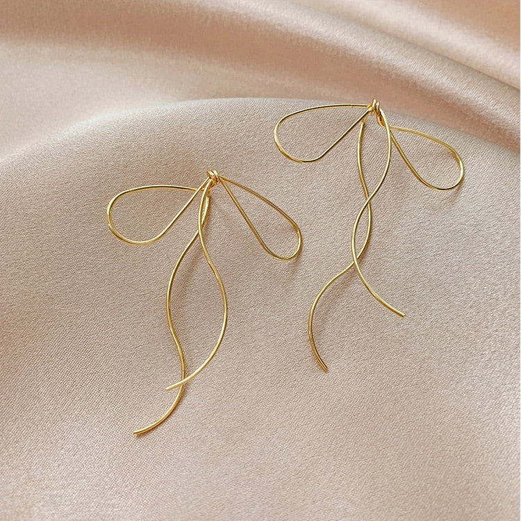 2022 Korean design jewelry simple and smart line bow earrings elegant female metal earrings