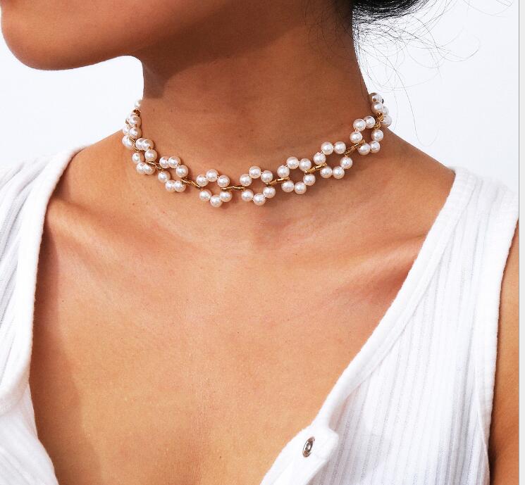 European and American cross-border creative jewelry simple hollow flower necklace retro pearl inlaid necklace women