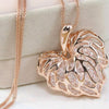 Recently, a woman full of gold silver heart-shaped crystal rhinestone pendant necklace sweater long chain necklace