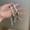 French Geometric Big Bow Pendant Pearl Necklace Female Niche Cold Wind Ins Personality Exaggerated Clavicle Chain Tide
