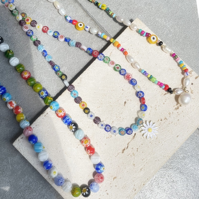 HUANZHI 2021 Colorful Freshwater Pearl Flower Acrylic Resin Devil Eye Asymmetry Beaded Clavicle Necklace for Women Jewelry