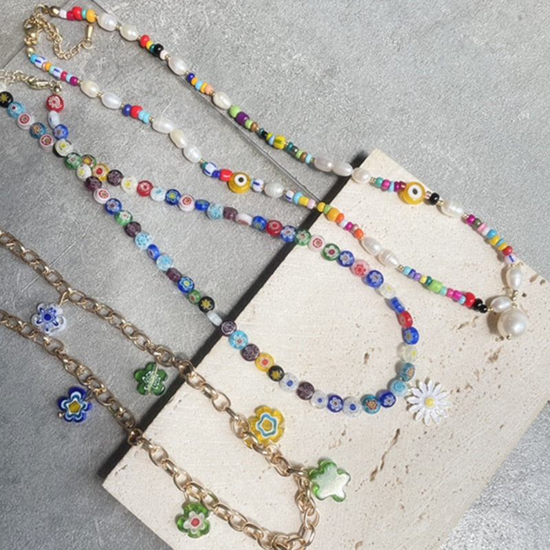 HUANZHI 2021 Colorful Freshwater Pearl Flower Acrylic Resin Devil Eye Asymmetry Beaded Clavicle Necklace for Women Jewelry