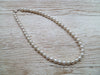 Half pearl half chain necklace
