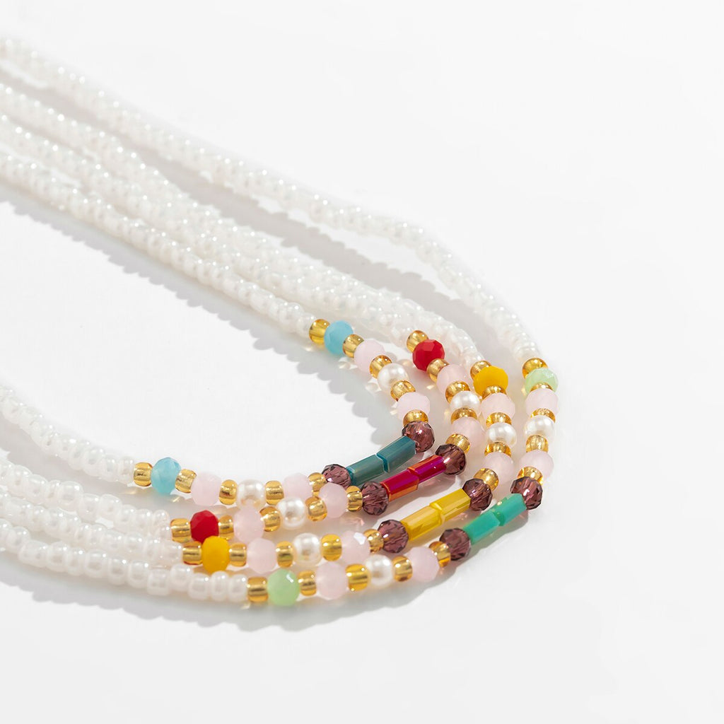 IngeSight.Z 4Pcs/set Bohemia Elastic Colored Crystal Rice Bead Waist Belly Chain for Women Sexy Beach Party African Body Chain