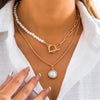 IngeSight.Z Multi Layered White Imitation Pearl Chain Toggle Choker Necklaces Women Angel Carved Coin Pendant Necklaces Jewelry