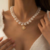 IngeSight.Z Multi Layered White Imitation Pearl Chain Toggle Choker Necklaces Women Angel Carved Coin Pendant Necklaces Jewelry