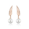 JeeMango Classic Titanium Steel Angel Wings Earrings Jewelry Rose Gold Simulated Pearl Wedding Stud Earrings For Women E18035