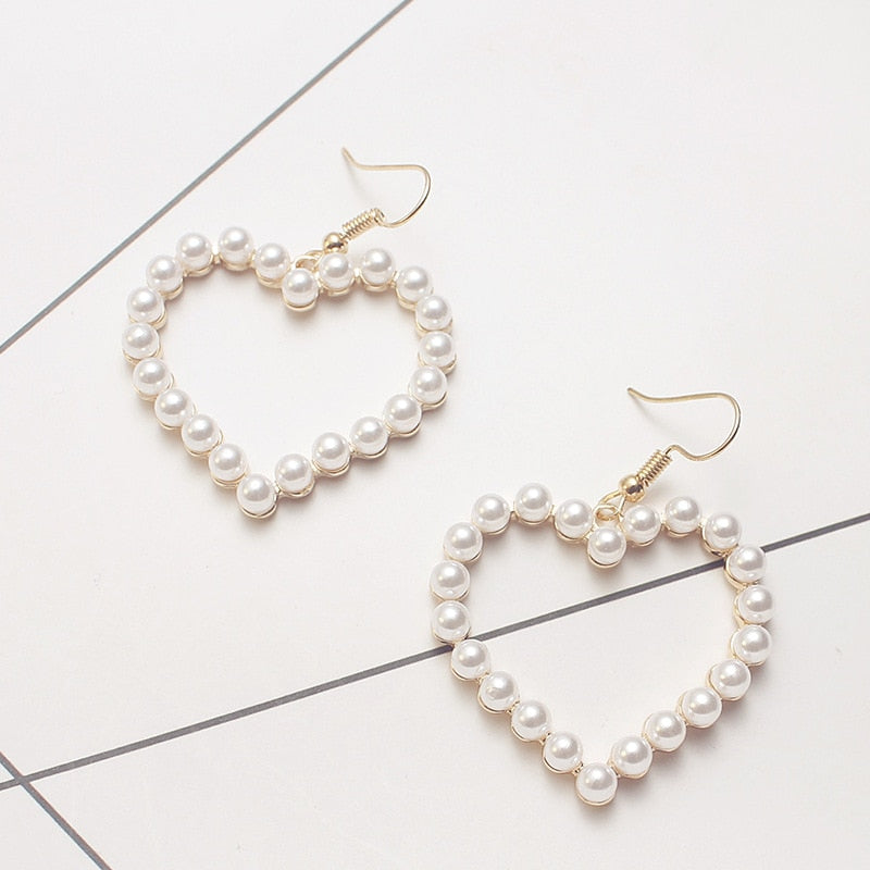 Lovely Hearts of Pearl Earrings Hot Melting Lovely Hollow Out Hearts of Pearl Earrings Popular Peach Heart Pendant Jewelry