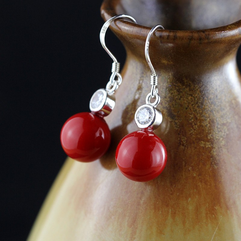 Natural mother shell pearl earrings 925 sterling silver bead earrings Min Bei against over 1.4cm in diameter