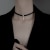 Design Simple Ladies Clavicle Chain Neck Fresh And Luxurious Word Black Cool Ribbon Temperament White Pendant Jewelry Gift