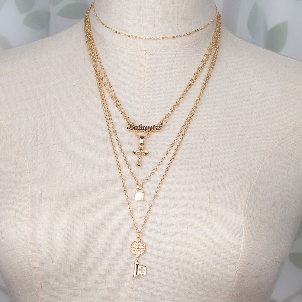 European and American Style Multi-layer Golden Pendant Necklace Ladies Letter Key Alloy Medium and Long Necklace.