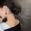 South Korea's design jewelry sexy black love tassel pendant earrings elegant women's prom party accessories