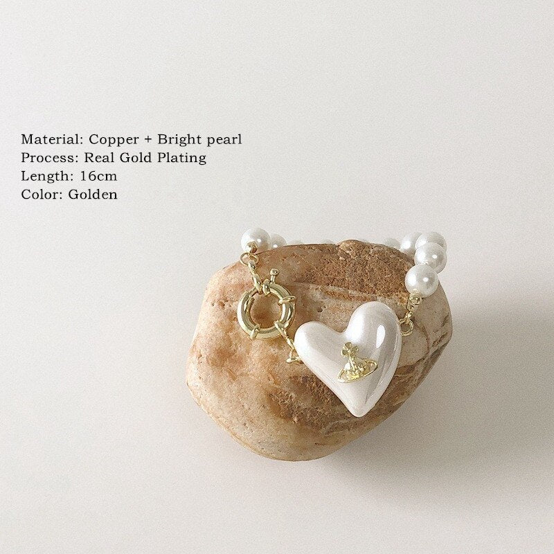 Spring Vintage Trend Love Pearl Planet Shape Women's Party Necklace Jewelry Clavicle Necklace Gift Hangzhi 2021