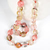 The Some Like it watermelon red 10 mm Watermelon jas- per necklace.  Pink  and  delicate semiprecious