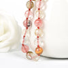 The Some Like it watermelon red 10 mm Watermelon jas- per necklace.  Pink  and  delicate semiprecious