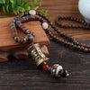 Vintage Tibet Prayer Wheel Pendant Necklace Metal Carved Buddhist Om Mani Pedme Gaou Wheel Amulet Necklace Wood Beads Necklace
