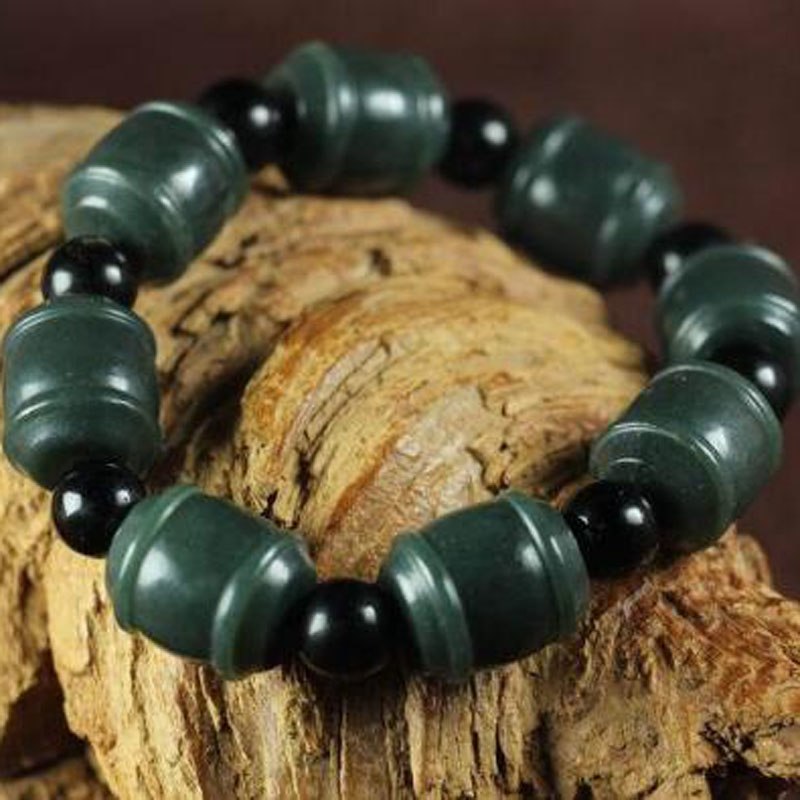 yu xin yuan natural green qing yu jade drum bracelet and black bead